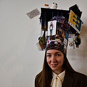 Dr Evgeniia Dorinova proudly presents her doctoral hat