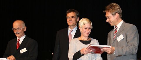 S. Luff receiving her award